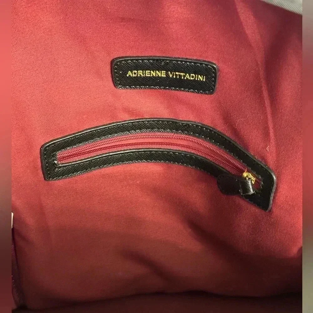 Adrienne Vittadini black nylon backpack and/or diaper bag adjustable straps‎